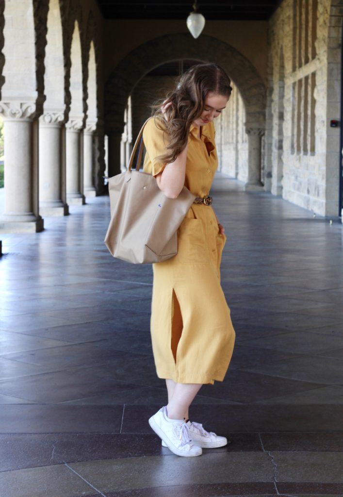 San Francisco Outfit of the day with long yellow midi dress and cheetah print belt and Adidas Sleek Sneakers