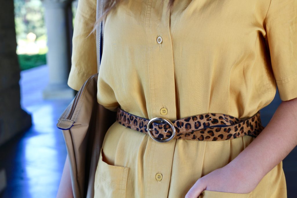 Cheetah Print belt tied around long yellow dress