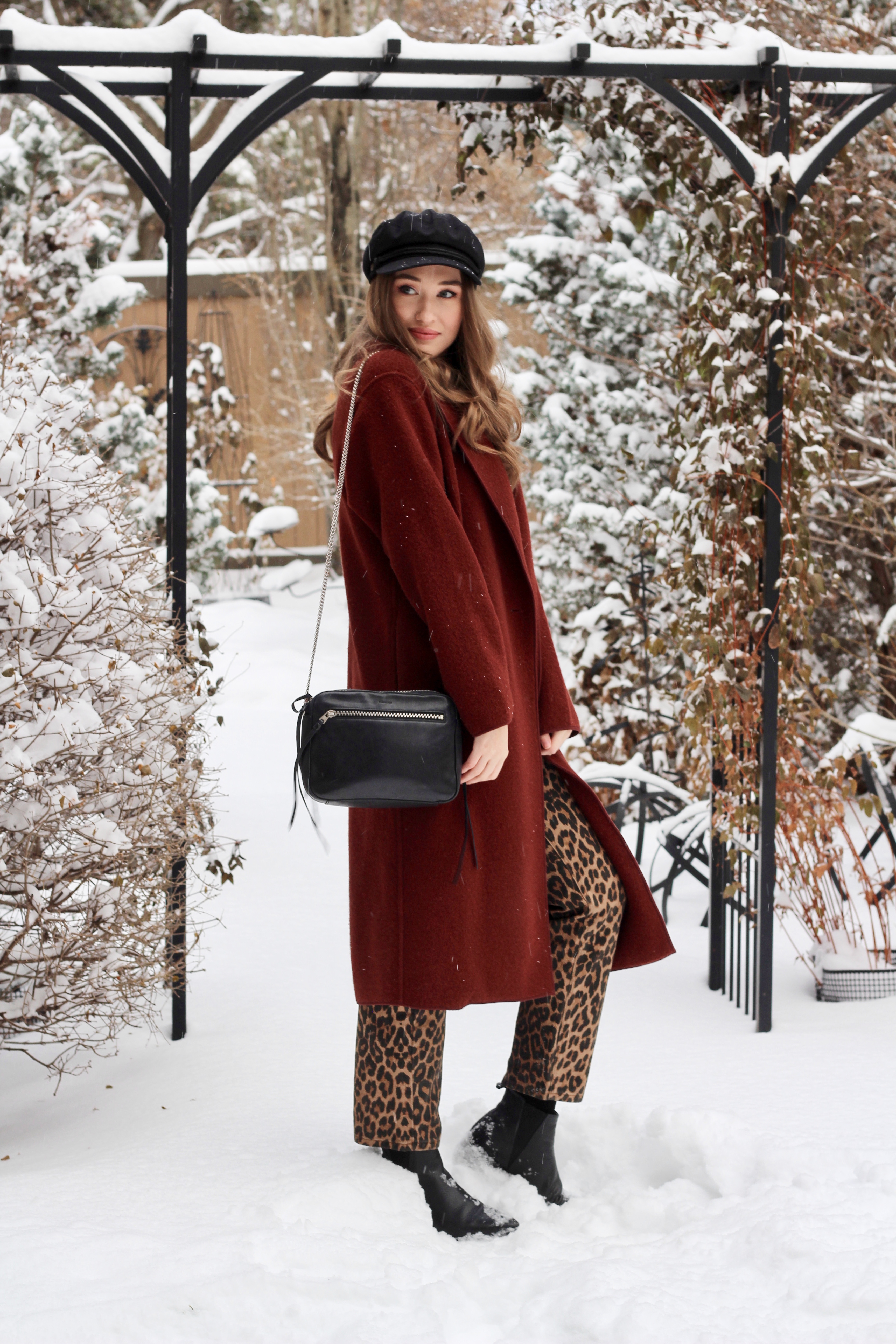 Outfit featuring Aritzia Charlize coat, Aritzia Only Turtleneck, Zara Cheetah print Jeans and Brixton Fiddler Hat