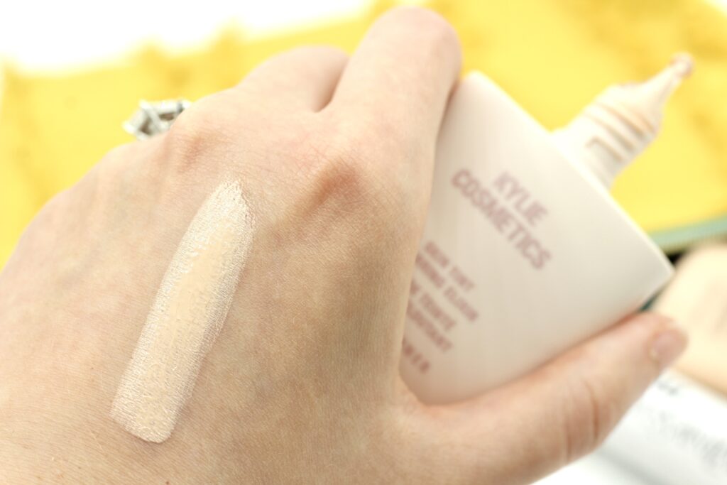 Arm swatch comparison of YSL Sephora and Kylie skin tints side by side